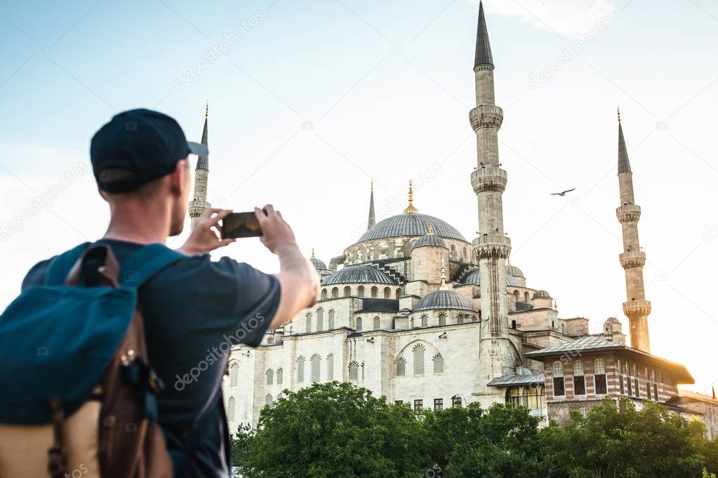 Tourist photographs the Blue Mosque