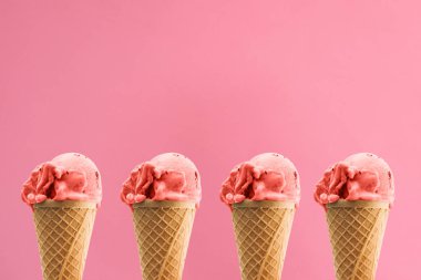 Ice cream in a waffle cup in a row