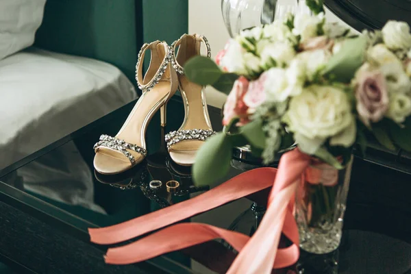 Wedding shoes and wedding rings