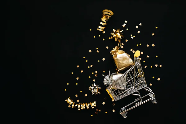 Shopping trolley and golden items