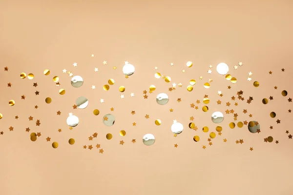 Gold and silver confetti — Stock Photo, Image