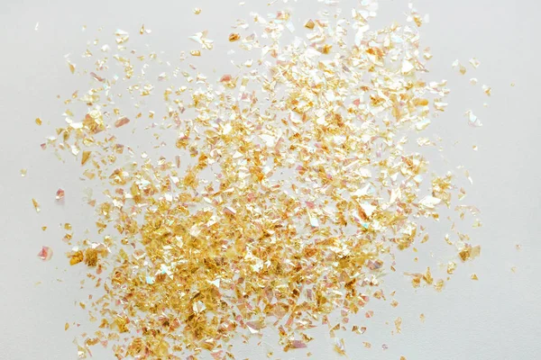 White background with golden confetti. — Stock Photo, Image