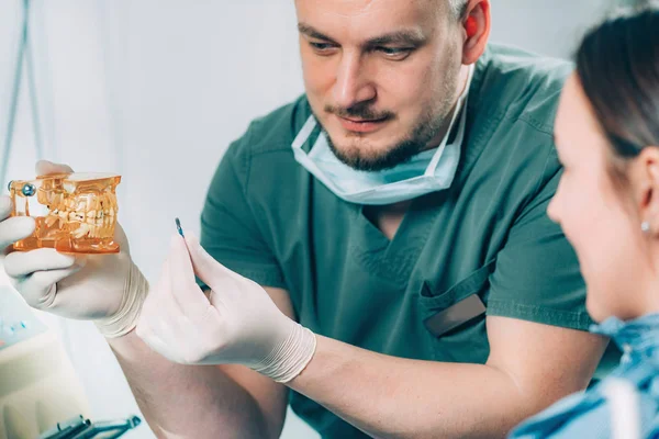 Dentist Explaining Dental Implant Procedure Patient Clinic — Stock Photo, Image