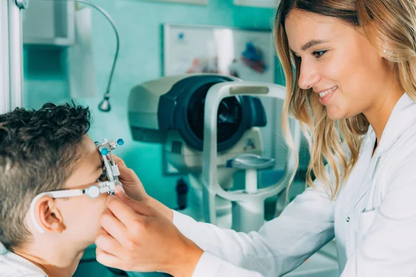 Ophthalmologist doing visual acuity test