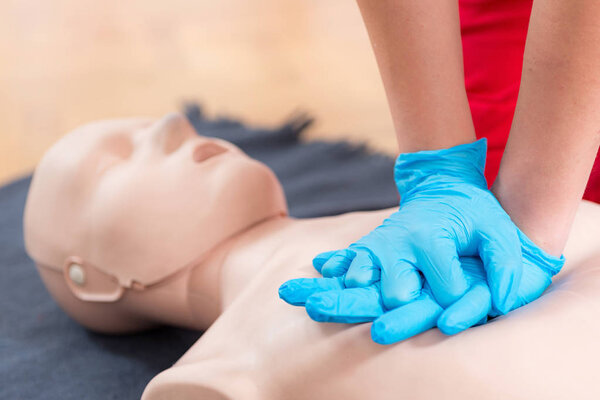 First Aid Training - Cardiopulmonary resuscitation. First aid course on cpr dummy