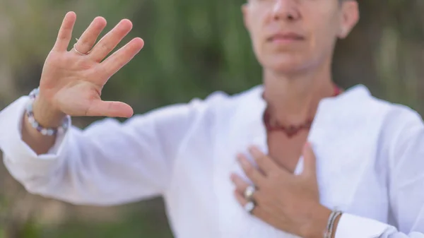 Spiritual Coach Sending Positive Thoughts Hand Gesture