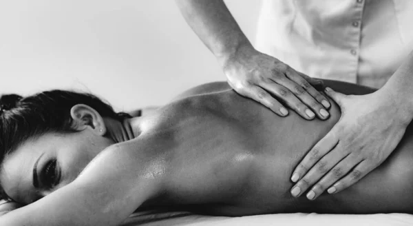 Physiotherapist Massaging Female Patient Injured Back Muscle Sports Injury Treatment — Stock Photo, Image