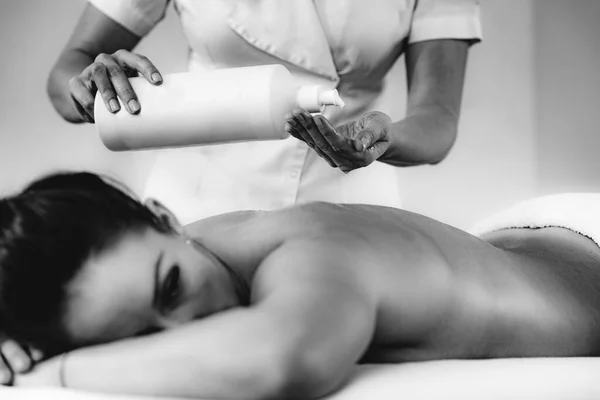 Physiotherapist Massaging Female Patient Injured Lower Back Muscle Sports Injury — Stock Photo, Image