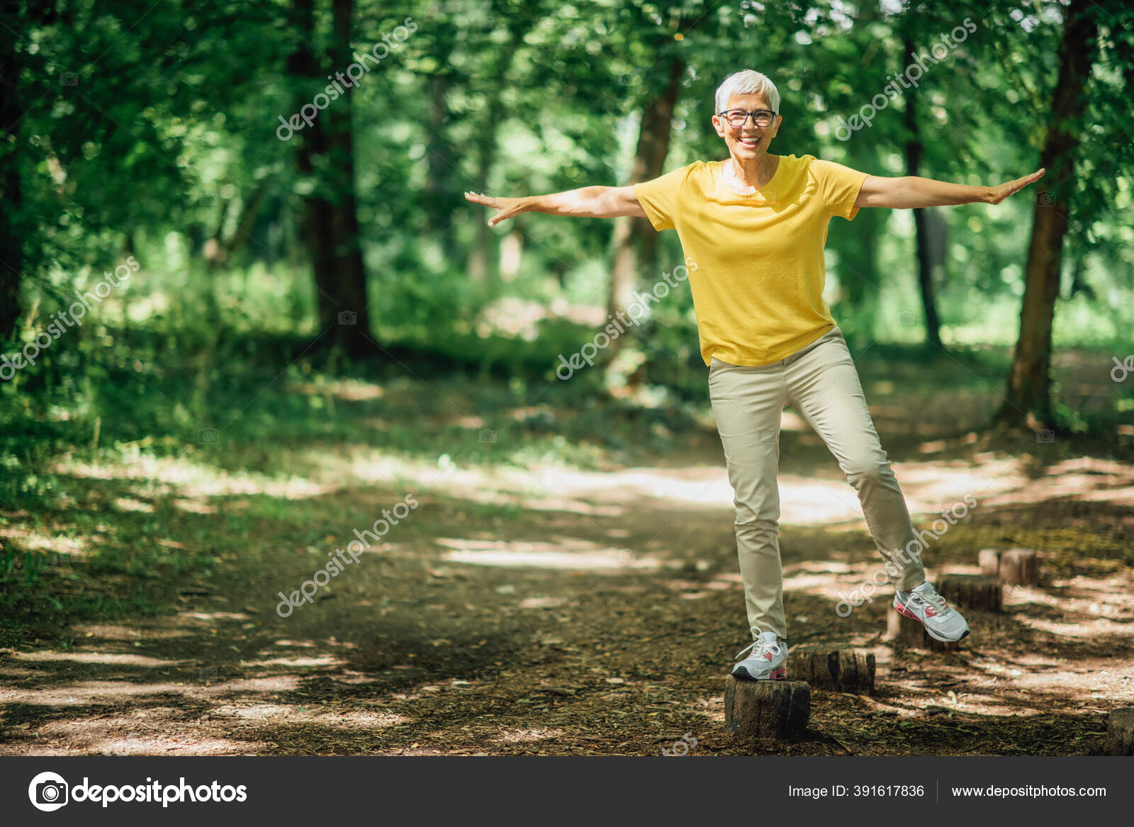 Balancing Exercise Outdoors Mature Woman Standing One Leg