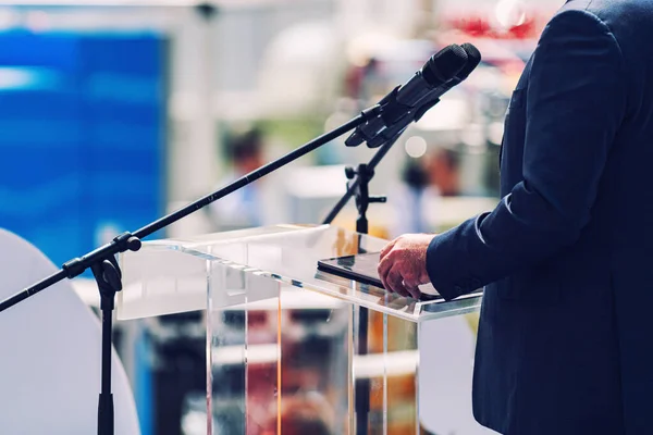 Male Speaker Wearing Suit Standing Front Microphones Media Press Conference — Stock Photo, Image