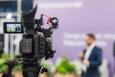 Camera recording at a media press conference preserves accurate details of the event. It ensures clear documentation, enabling broader access to information and transparent communication.