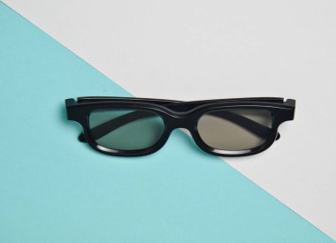 pastel renkli bir arka plan üzerinde 3D gözlük. Minimalist eğilim, üstten görünüm, düz yatıyordu