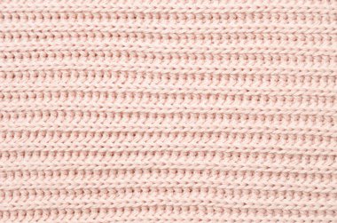 Pembe örgü kazak yakın çekim doku. Üstten görünüm. Tekstil Giyim.
