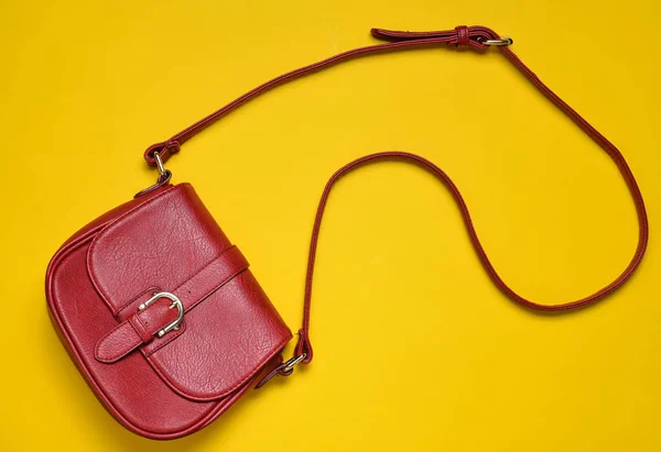 Red Leather Bag Long Strap Yellow Background Women Accessories Top — Stock Photo, Image