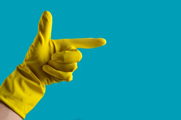 Mano Con Guanto Gomma Giallo Sta Puntando Sul Lato Uno — Foto Stock