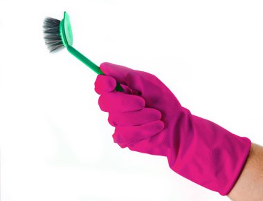 Beyaz arka plan üzerinde izole sarı lateks eldiven ile el temizliği için fırça. Temizlik concep