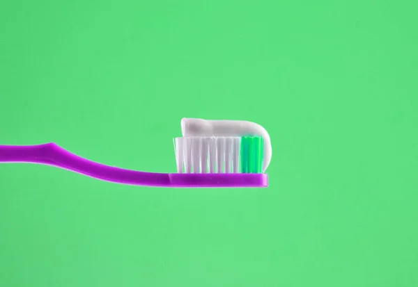 Toothpaste Pink Toothbrush Close Blue Light Background — Stock Photo, Image