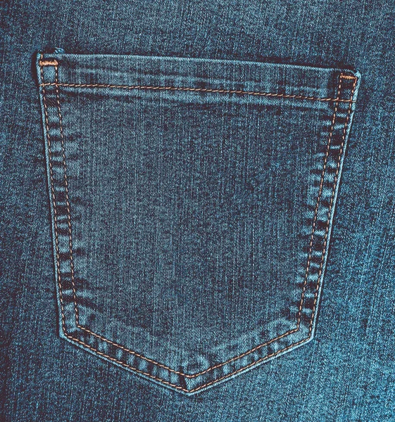 Denim texture. Back pocket of the jeans.