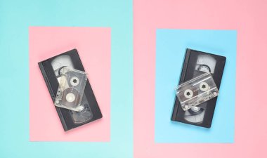 Ses kaset, video kaset pembe pastel mavi arka plan üzerinde. Retro öznitelikleri 80s. Top Vie