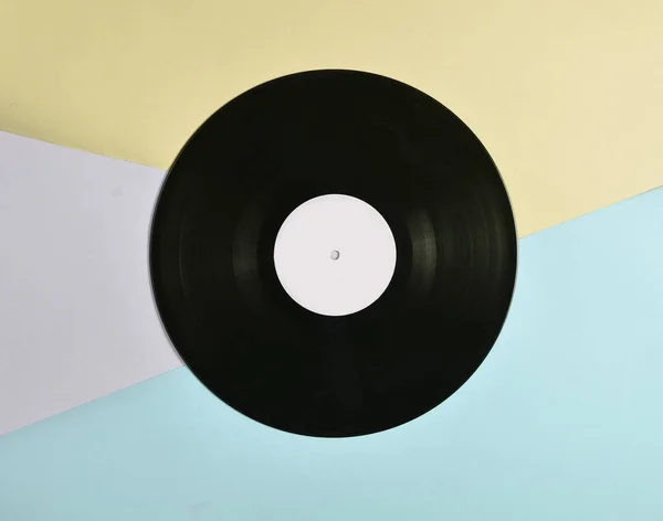 Vinylplatte Auf Farbigem Pastell Hintergrund Retro Musiktechnik Draufsicht Minimalis — Stockfoto