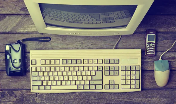 Retro Stationary Computer Rustic Wooden Desk Vintage Workspace Monitor Keyboard — Stock Photo, Image