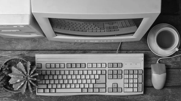 Retro Stationary Computer Rustic Wooden Desk Vintage Workspace Monitor Keyboard — Stock Photo, Image