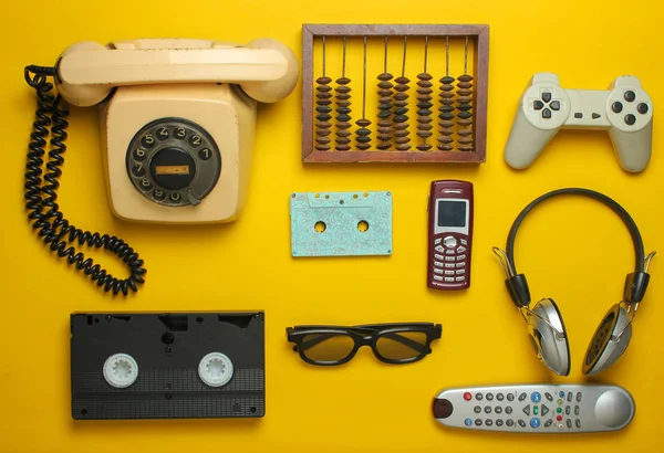 Retro Objects Yellow Background Rotary Telephone Audio Cassette Video Cassette — Stock Photo, Image