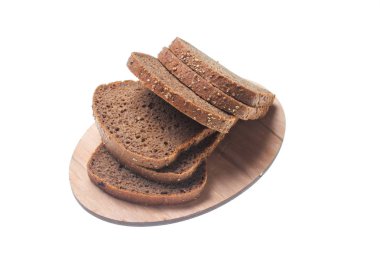 Wheat bread slices on a wooden board isolated on white background.