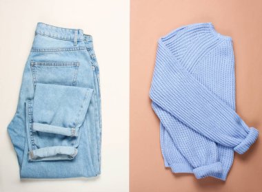 Düz döşeme tarzı örgü kazak, pastel arka plan üzerinde trendy mavi kot, üst görünümü, minimalizm