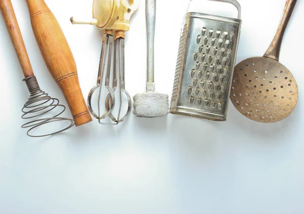 Old kitchen tool on white background. Retro kitchen, vintage cooking tool set. Top view