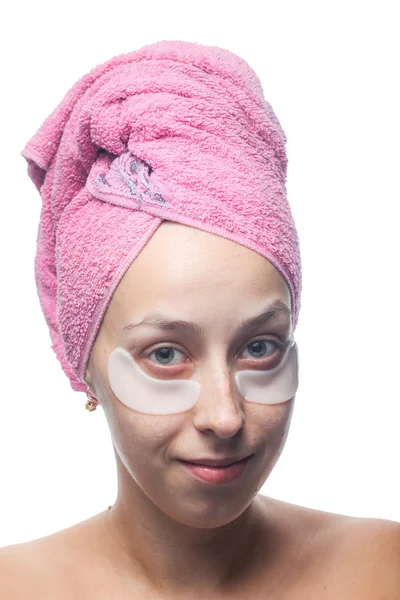 Smiling Young Woman White Patches Eyes Pink Towel Her Head — Stock Photo, Image