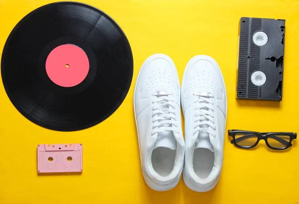 Pop Culture White Hipster Sneakers Vinyl Plate Audio Video Cassette — Stock Photo, Image