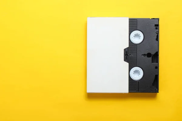 Video Cassette Cover Videotape Yellow Background Top View Minimalism — Stock Photo, Image