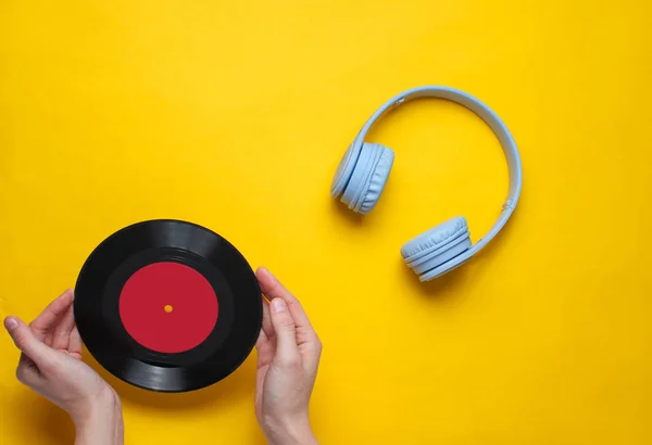 Women Hands Hold Vinyl Record Yellow Background Ear Headphone Pop — 스톡 사진