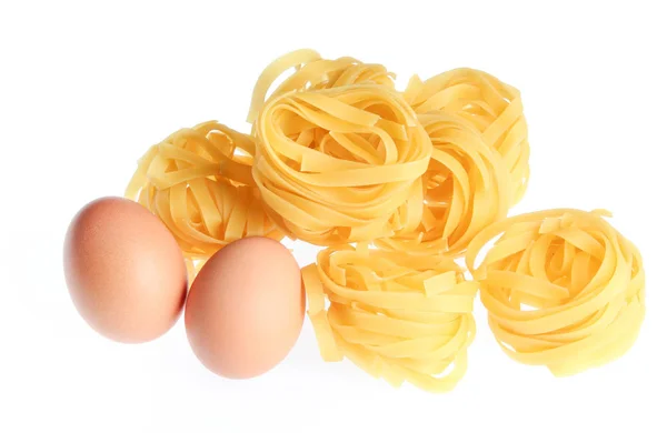 Raw Dry Tagliatelle Noodle Eggs Isolated White Background — Stock Photo, Image