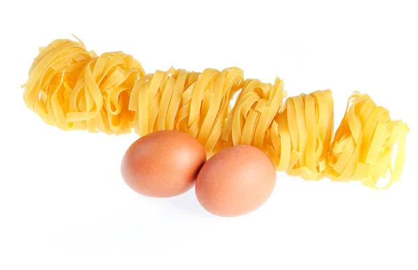 Raw Dry Tagliatelle Noodle Eggs Close Isolated White Background — Stock Photo, Image