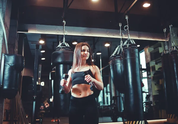 Attractive Athletic Girl Sportswear Holds Dumbbells Her Hands Trains Biceps — Stock Photo, Image