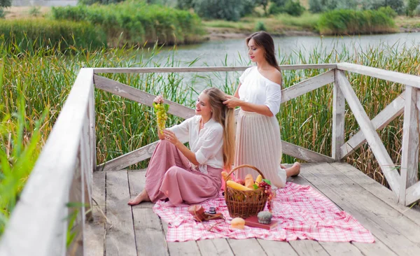 Two Cheerful Young Women Have Picnic Outdoors Summer Day Two — Stock Photo, Image