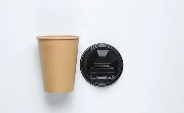 Disposable empty coffee cup with natural materials on a white background. Eco friendly concept