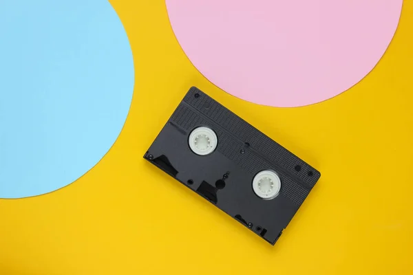 Video Cassette Yellow Background Blue Pink Pastel Circle Copy Space — Stock Photo, Image