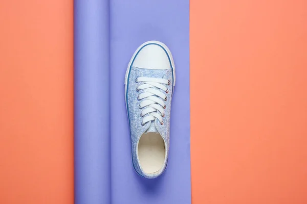 Sneakers Wrapped Paper Background Color Trend Minimalistic Fashion Still Life — Stock Photo, Image