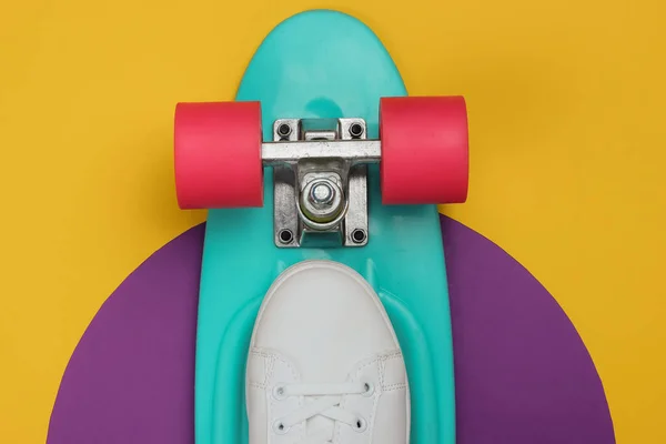 Stylish White Sneakers Cruiser Board Colored Background Summertime Fun Studio — Stock Photo, Image