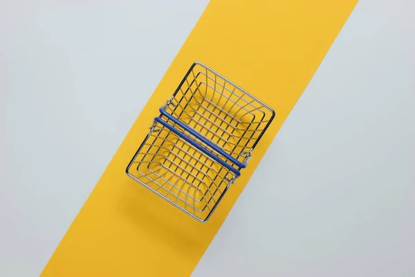 Minimalistic Shopping Concept Shopping Basket White Yellow Background — Stock Photo, Image