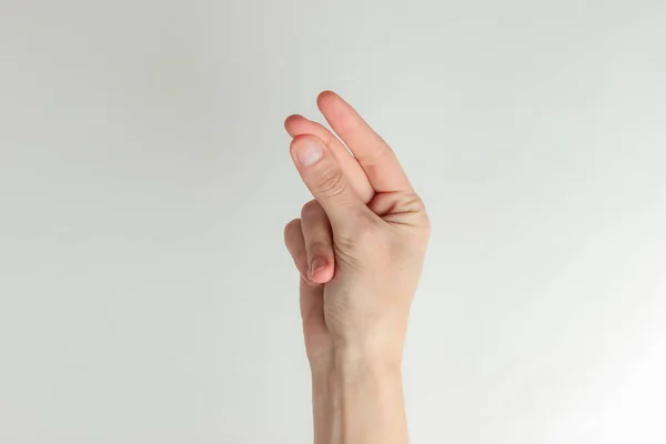 Γυναικείο Χέρι Δείχνει Μετρητά Χειρονομία Ζητώντας Χρήματα Λευκό Φόντο — Φωτογραφία Αρχείου