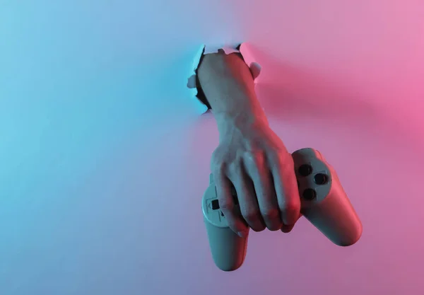 Hand Holds Gamepad Torn Hole Creative Pop Art Pink Blue — Stock Photo, Image