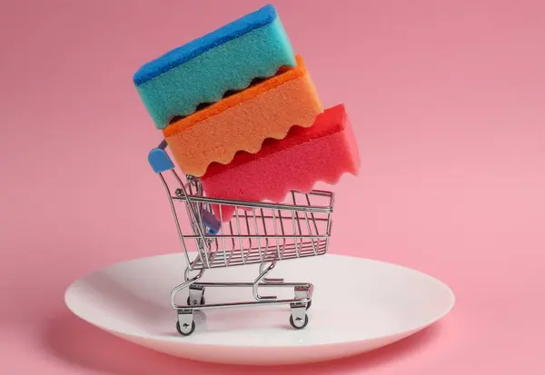 Mini Shopping Trolley Sponges Washing Dishes Plate Pink Pastel Background — Stock Photo, Image