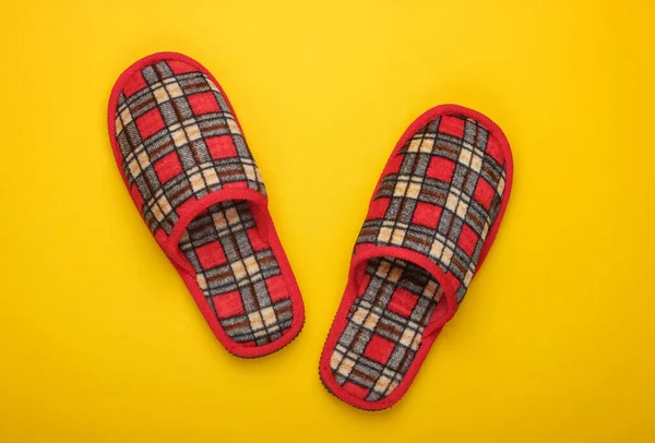 Checkered Indoor Slippers Yellow Background Top View — Stock Photo, Image