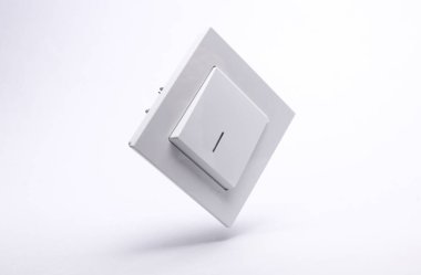 Beyaz arkaplanda süzülen ışık düğmesi