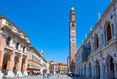 Vicenza, Italy - May 9, 2011: The  palaces and tower of Dei Signori square clipart