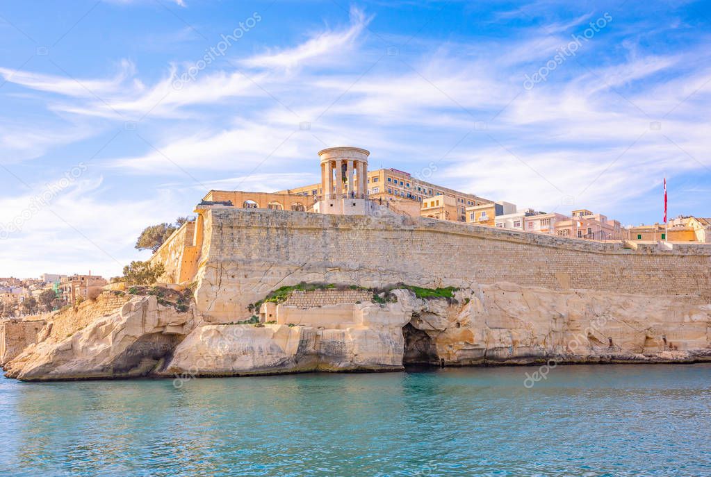 Malta, Valletta, view from the sea of the Siege bell monument, a World War II Memorial site in the Upper Barakka gardens